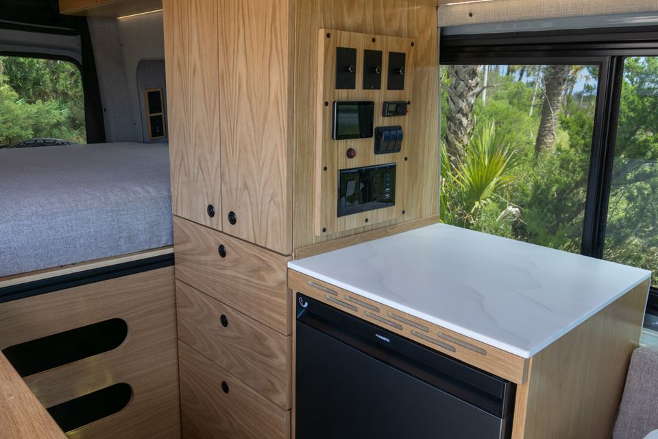 Maple storage cabinets inside the Drifter