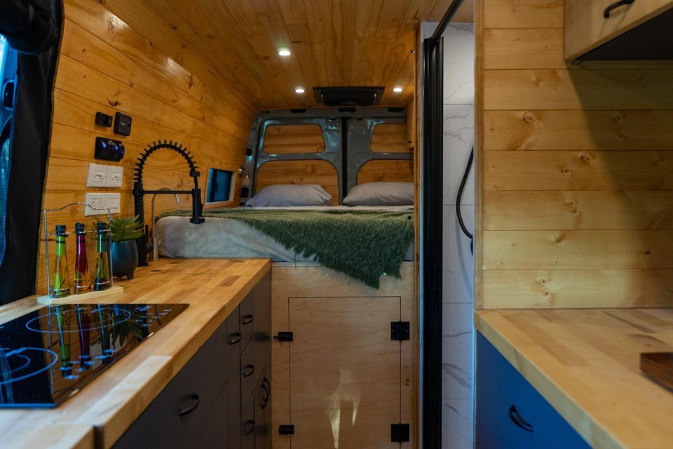 A wood galley with an induction cooktop