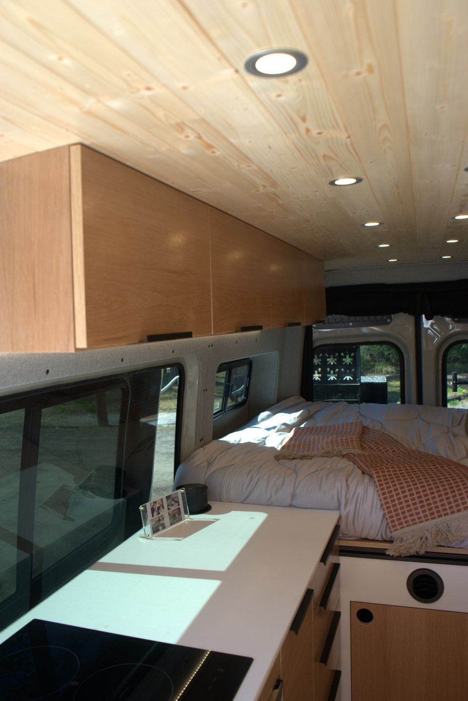 Inside a custom Sprinter looking toward the rear