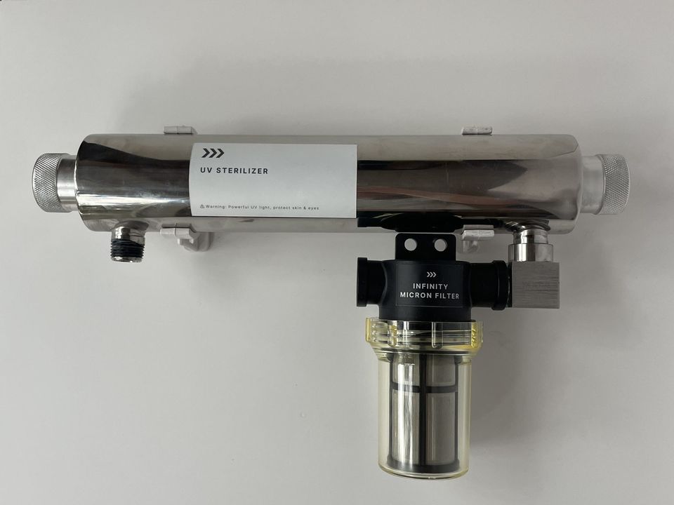 The Infinity Shower UV sterilizer with the micron filter canister below