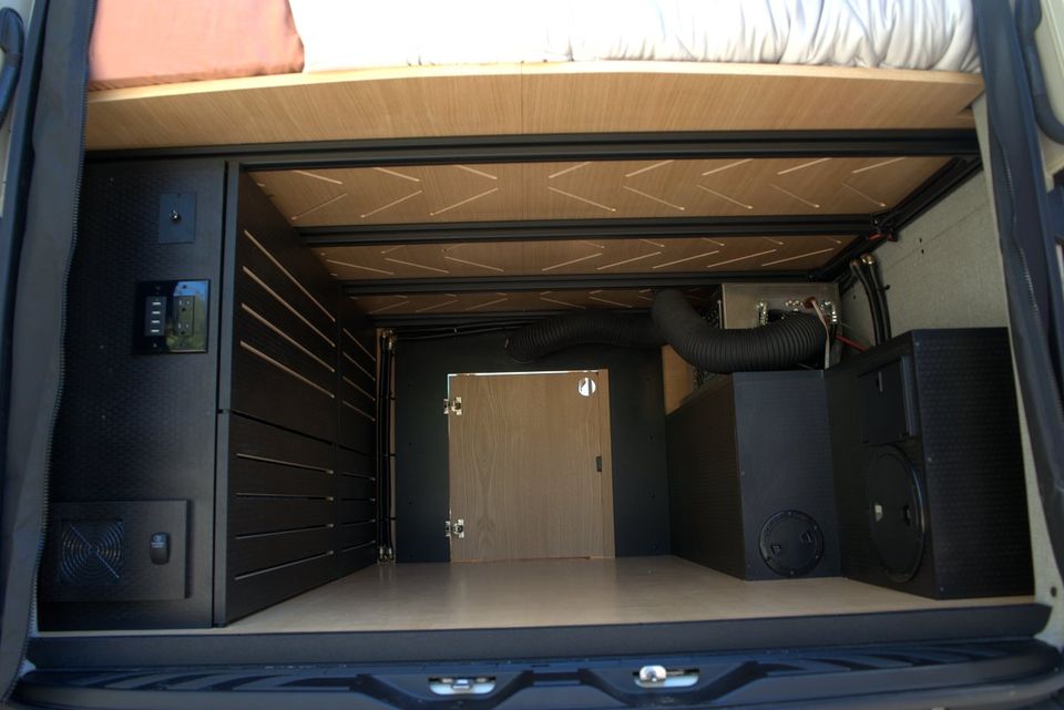 A finished van interior with climate controls