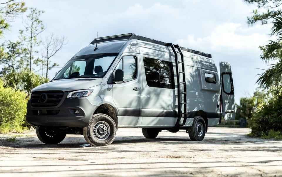 A silver Sprinter with AM Auto windows and Flare Space flares